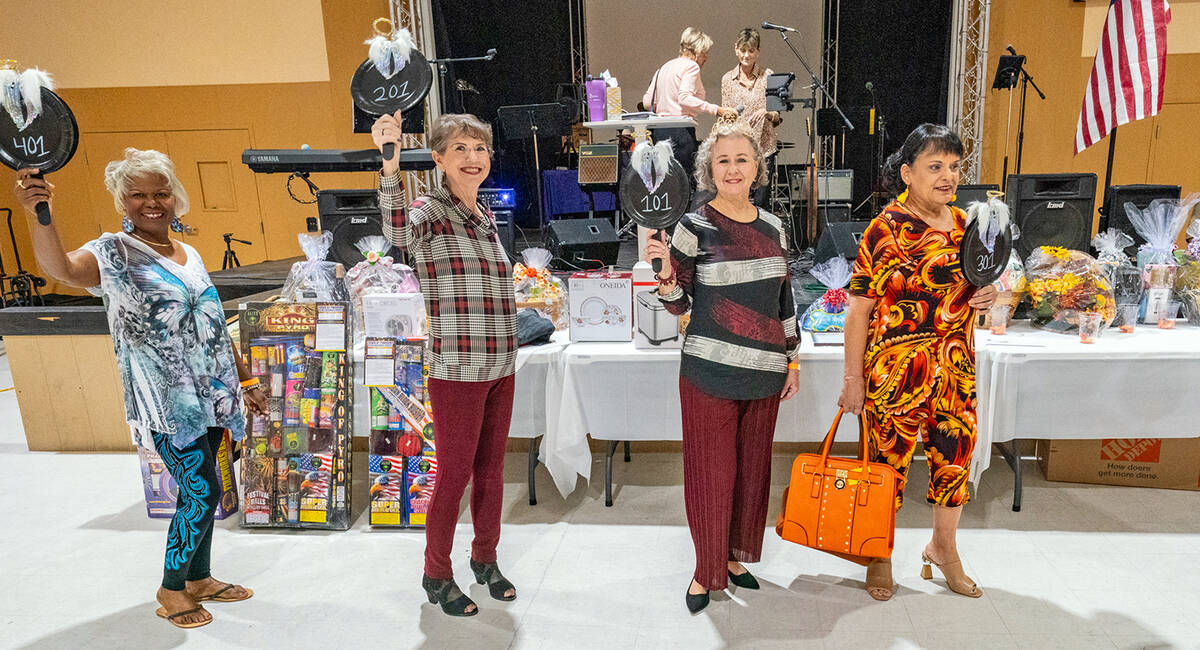 John Clausen/Pahrump Valley Times Ladies from Ms. Senior Golden Years modeled outfits from Sunf ...