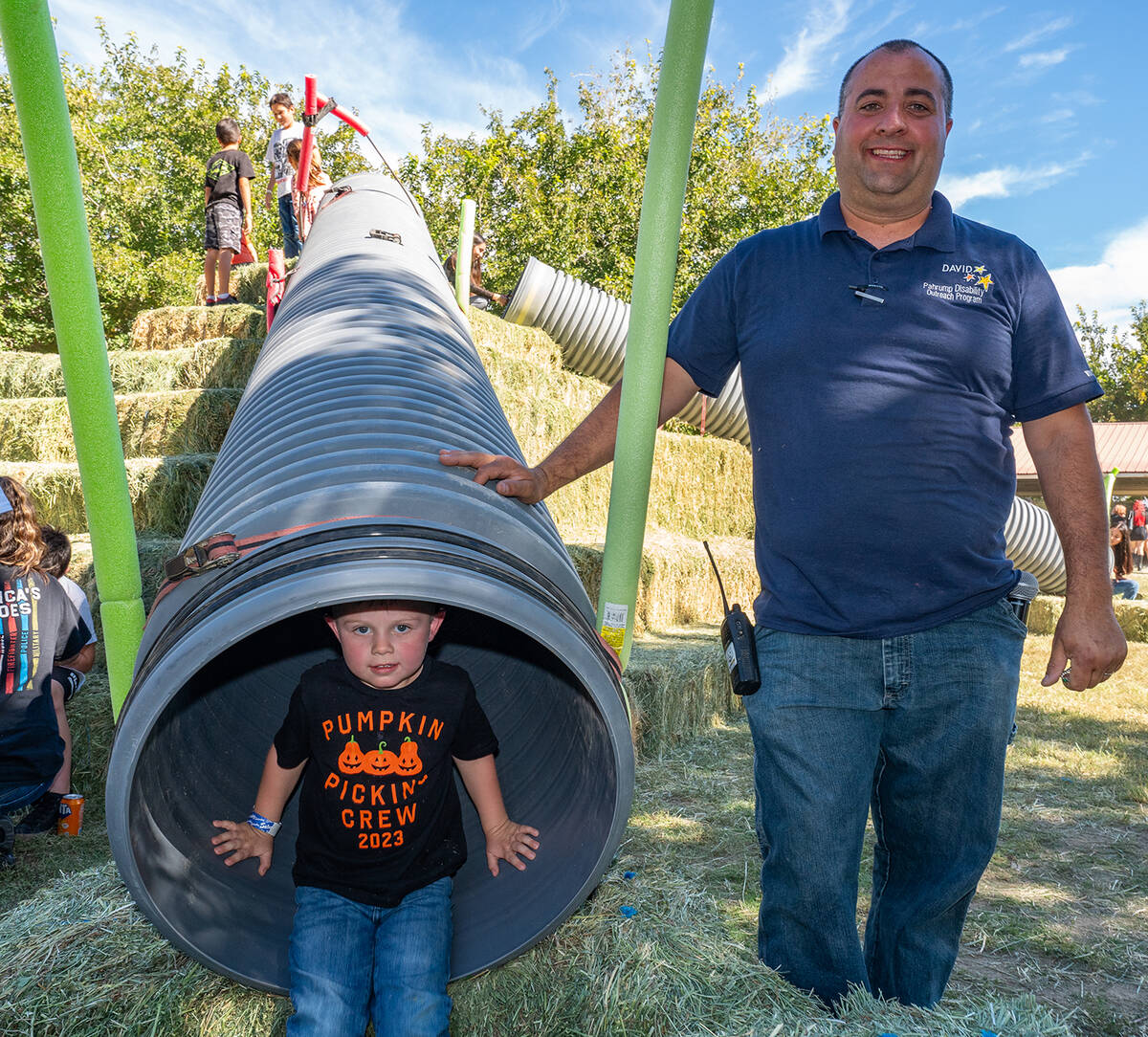 John Clausen/Pahrump Valley Times PDOP President David Boruchowitz and a Pumpkin Days attendee ...