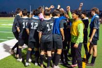 The Pahrump boys soccer team huddles before their game against Doral Academy on Thursday, Sept. ...