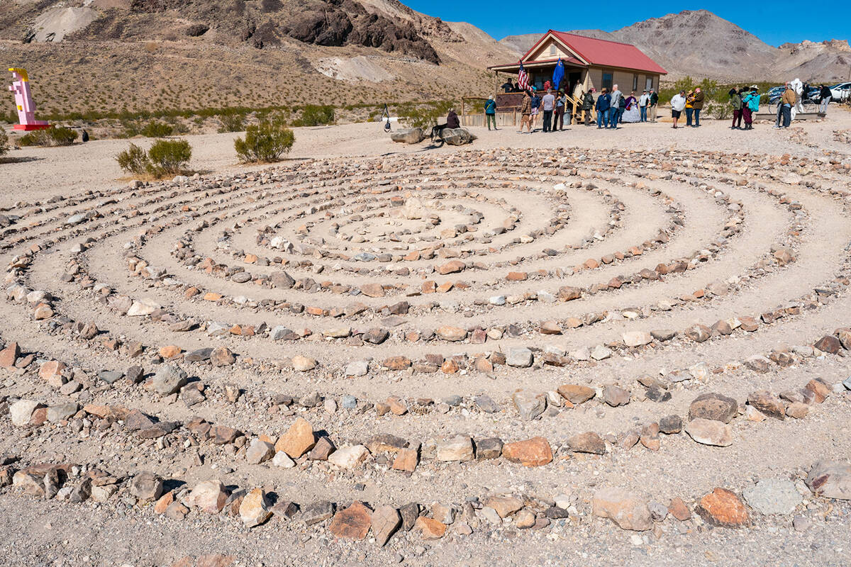 John Clausen/Pahrump Valley Times Winding in a spiraling pattern, this piece titled "Medicine W ...