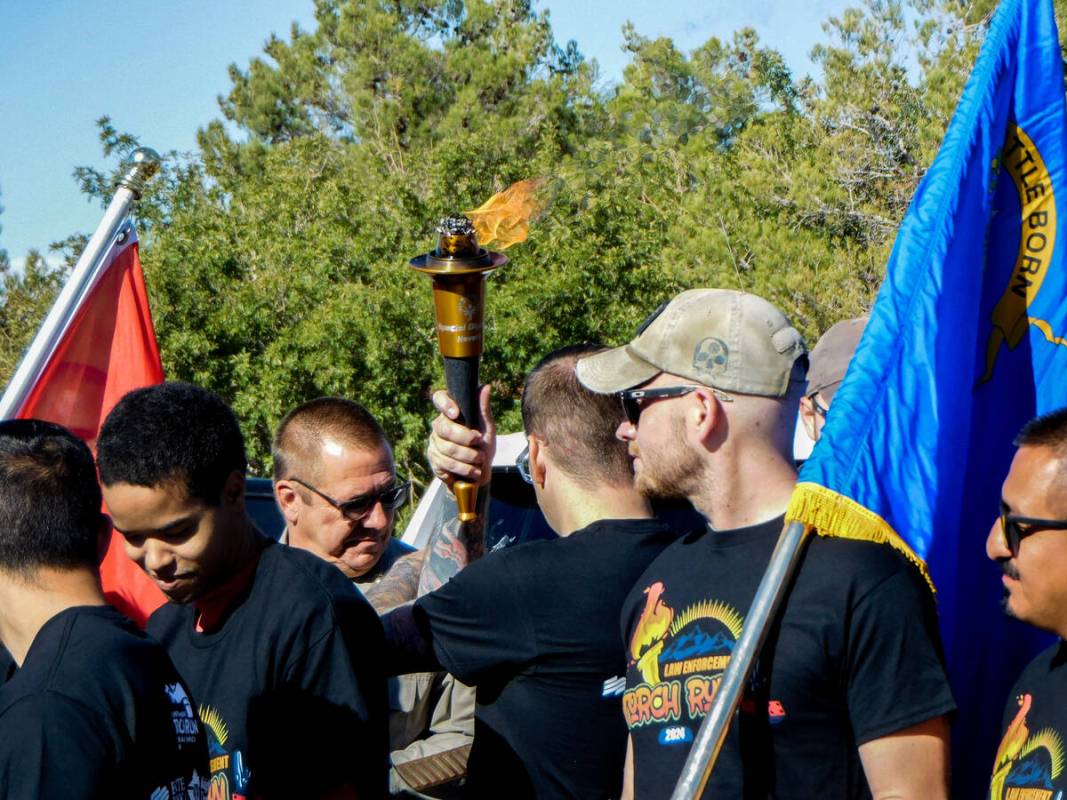 Nye County Sheriff's Office and Special Olympics Nevada athletes gather after the Nye County To ...