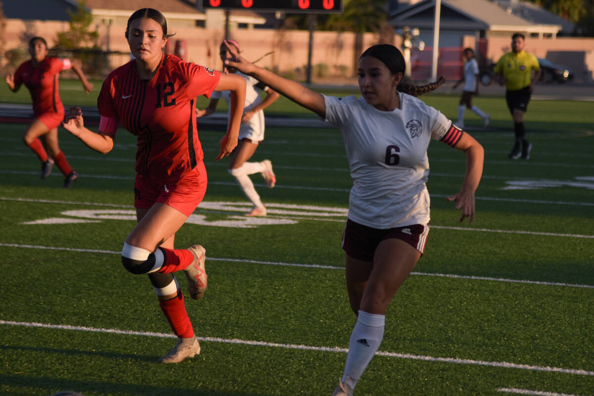 Pahrump Valley’s Natalia Vallin (6) (right) goes head-to-head with Mater Academy East La ...