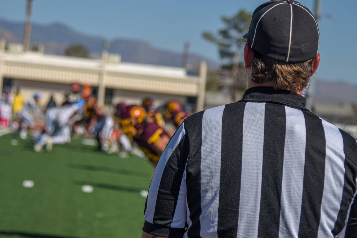 A referee watches the Trojans play against MAELV on Saturday, Oct. 5, 2024, in Pahrump. Pahrump ...