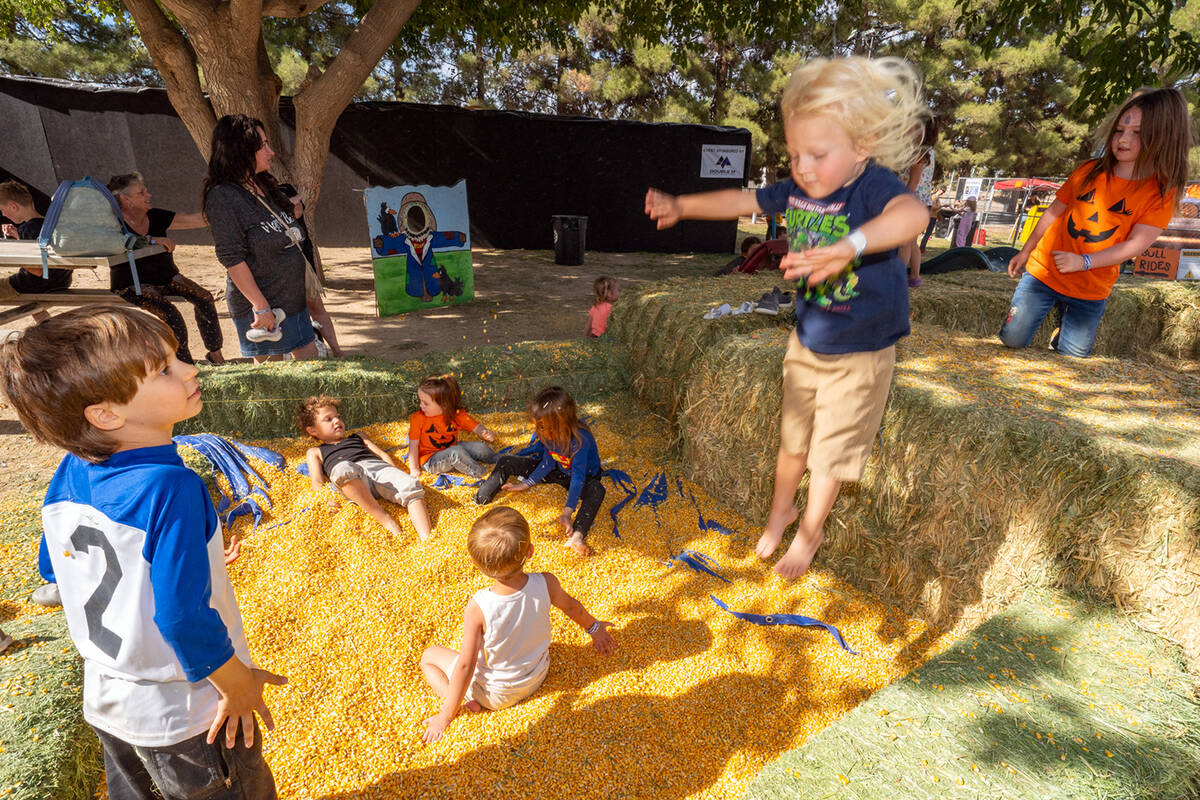 John Clausen/Pahrump Valley Times Energetic children loved the fun offered by the corn jump, a ...