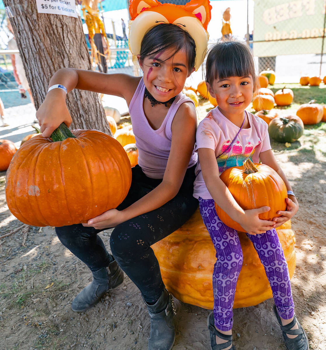 John Clausen/Pahrump Valley Times A couple of youngsters were quite pleased with the pumpkins t ...