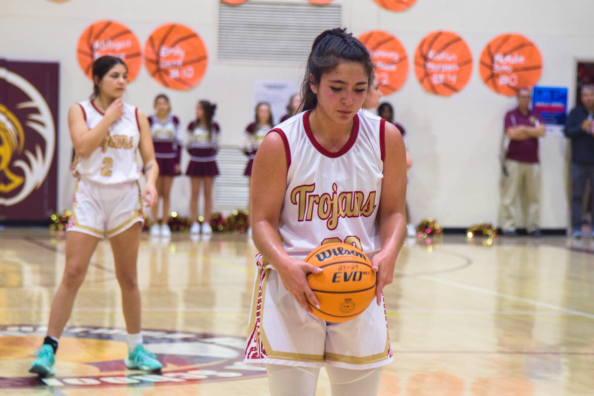 Paris Coleman (33) zones in before she shoots her free-throw shots in the semifinals game in Pa ...