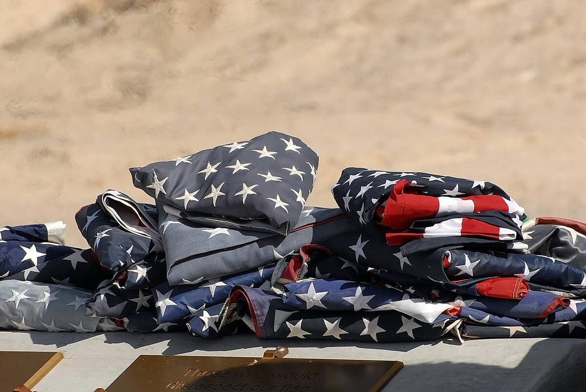 Horace Langford Jr./Pahrump Valley Times Dirty, dusty and torn, American Flags in need of a pro ...