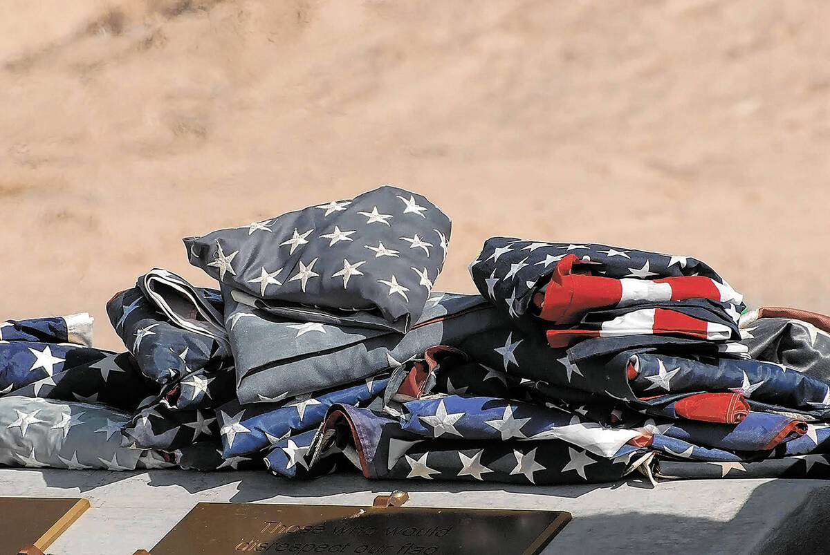 Horace Langford Jr./Pahrump Valley Times - Veteran's Day Flag retirement ceremony Friday, folde ...