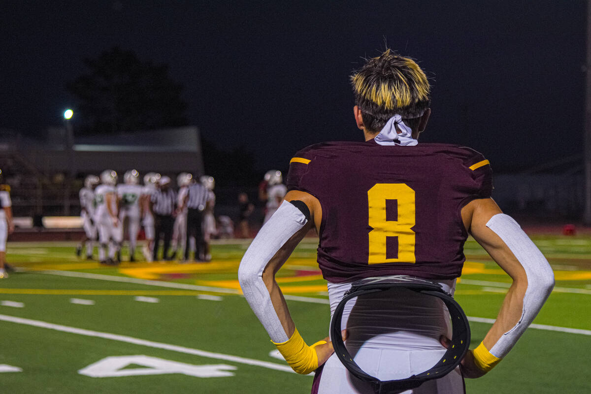 Trojan’s Kayne Horibe (8) stands and watches Sports Leadership and Management’s o ...