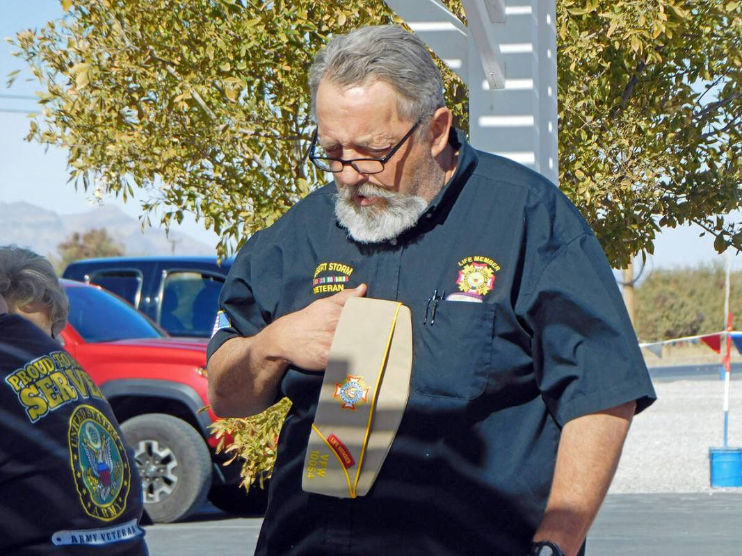 Robin Hebrock/Pahrump Valley Times VFW Post Commander Mark Sansom bows his head in prayer durin ...