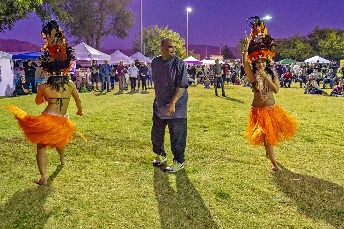 John Clausen/Pahrump Valley Times With brightly hued grass skirts aswirl, participants at A Hui ...