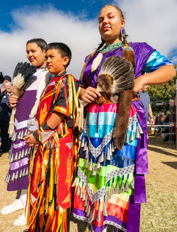 John Clausen/Pahrump Valley Times Native American regalia of bright colors, feathered fringes a ...