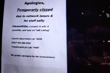 A sign at Pahrump’s AT&T office informs customers that the business will remain closed for th ...