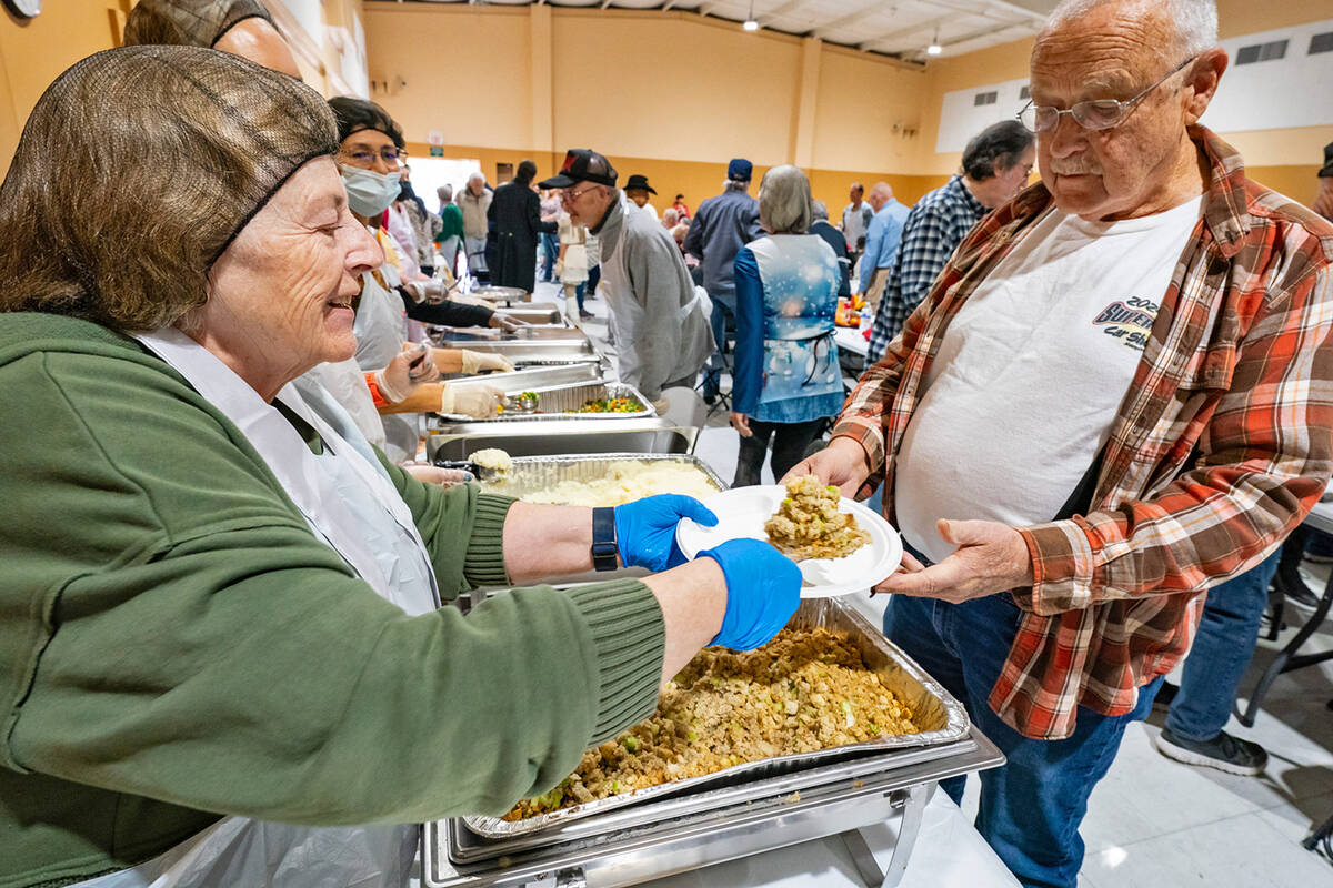 John Clausen/Pahrump Valley Times The buffet line at the Community Thanksgiving Dinner saw a st ...