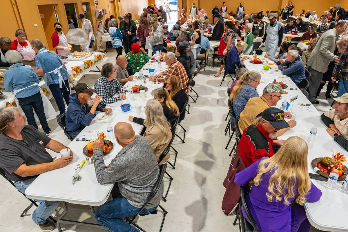 John Clausen/Pahrump Valley Times The NyECC Activities Center was packed with holiday meal-goer ...