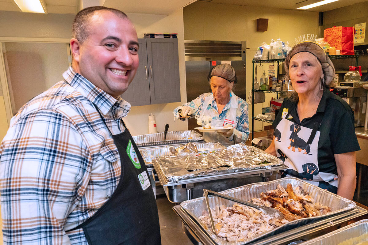 John Clausen/Pahrump Valley Times Taking on the task of kitchen duty at the Community Thanksgiv ...