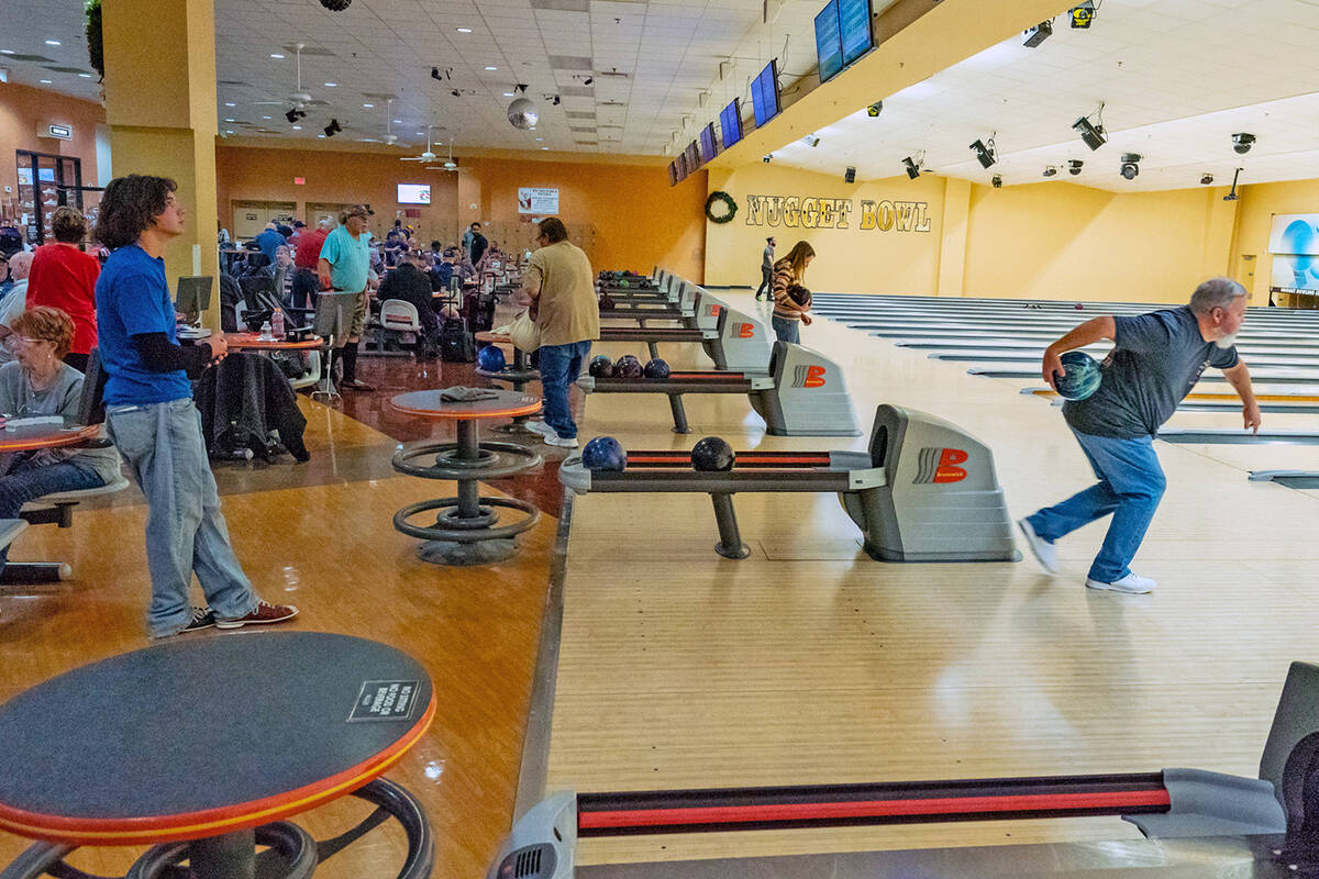 John Clausen/Pahrump Valley Times The Nugget Bowl was busy with the sounds of bowling balls gli ...