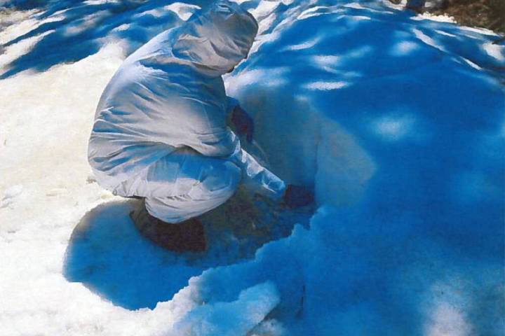 Desert Research Institute A staff member with the Desert Research Institute samples the snowpa ...