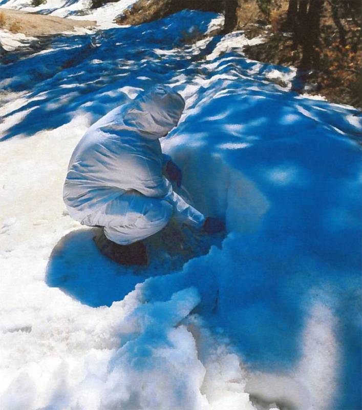 Desert Research Institute A staff member with the Desert Research Institute samples the snowpa ...