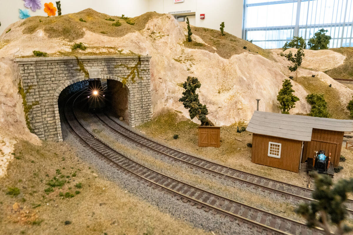 Model trains with realistic scenery and buildings were set up inside the Pahrump Community Libr ...