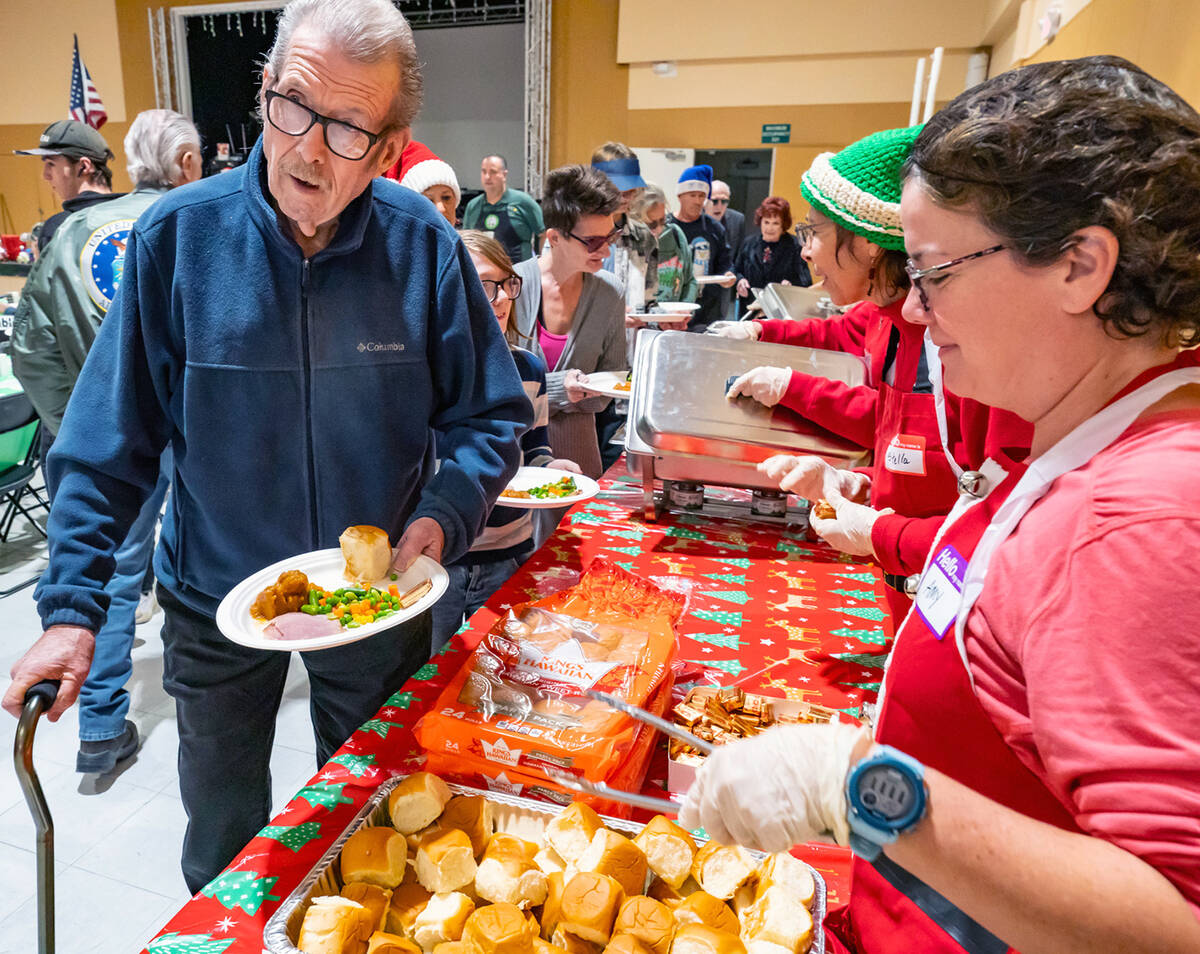 John Clausen/Pahrump Valley Times The Community Christmas Dinner buffet tables were laden with ...