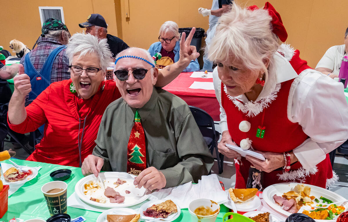 John Clausen/Pahrump Valley Times Friends, family and neighbors gathered together on Christmas ...