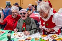 John Clausen/Pahrump Valley Times Friends, family and neighbors gathered together on Christmas ...