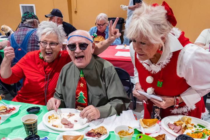 John Clausen/Pahrump Valley Times Friends, family and neighbors gathered together on Christmas ...