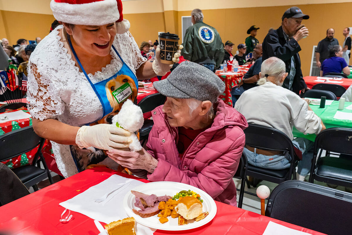 John Clausen/Pahrump Valley Times Volunteer Vicky Eyserbeck presents a Community Christmas Dinn ...