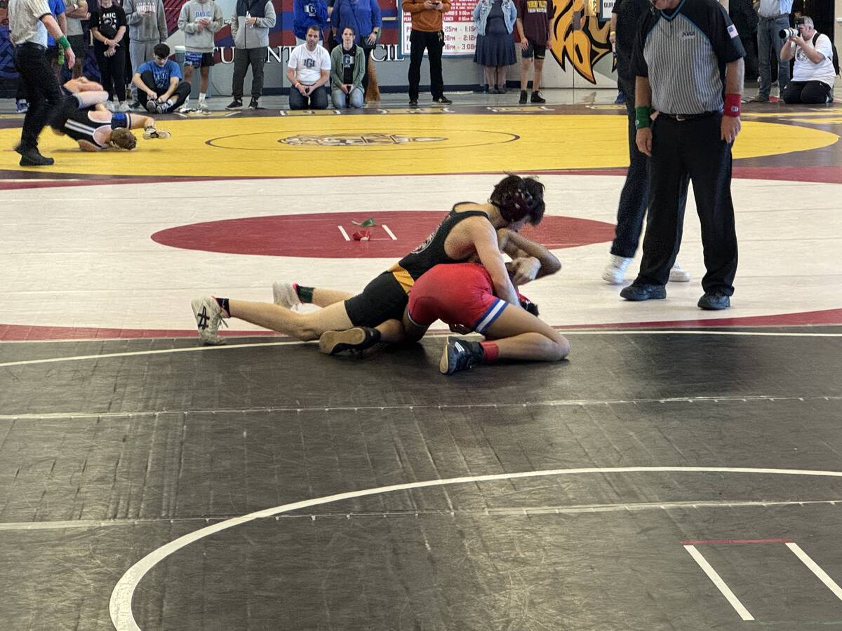 Jessica Sterling/Pahrump Valley Times Dominic Chiancone works to pin his opponent during his m ...