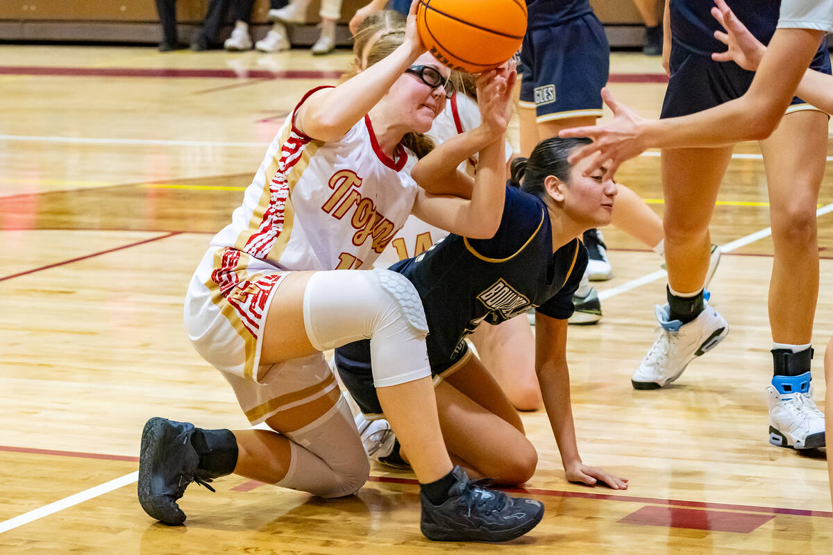 John Clausen/Pahrump Valley Times Junior forward Savannah Thompson scuffles to maintain possess ...