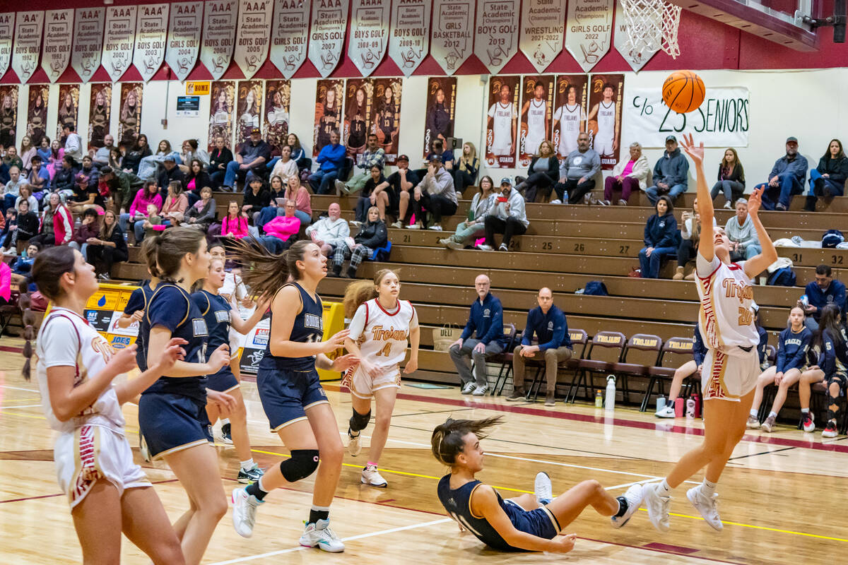 John Clausen/Pahrump Valley Times Sophomore point guard Riley Saldana goes up for the open shot ...