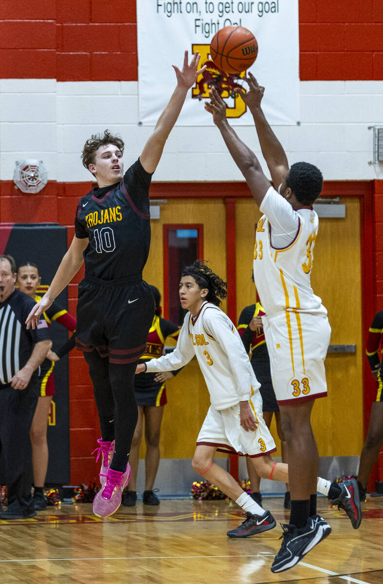 Pahrump Valley forward Lucas Gavenda (10) looks to interrupt o shot by Del Sol forward James He ...