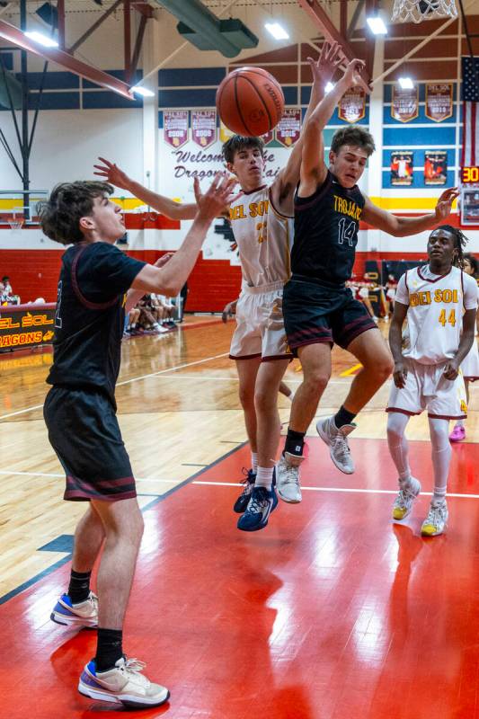 Pahrump Valley guard Caden Briscoe (2) looks to secure a loose ball created by Del Sol center W ...