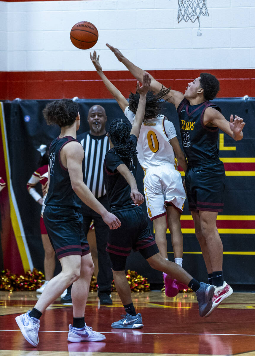 Pahrump Valley forward Jamiah Mendenhall (23) looks to defend a shot against Del Sol guard Prin ...