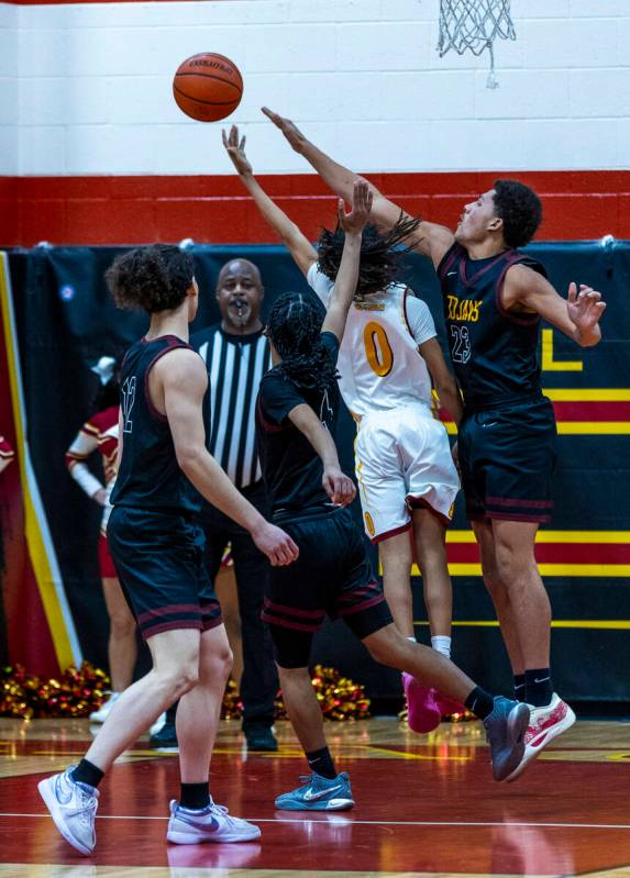 Pahrump Valley forward Jamiah Mendenhall (23) looks to defend a shot against Del Sol guard Prin ...