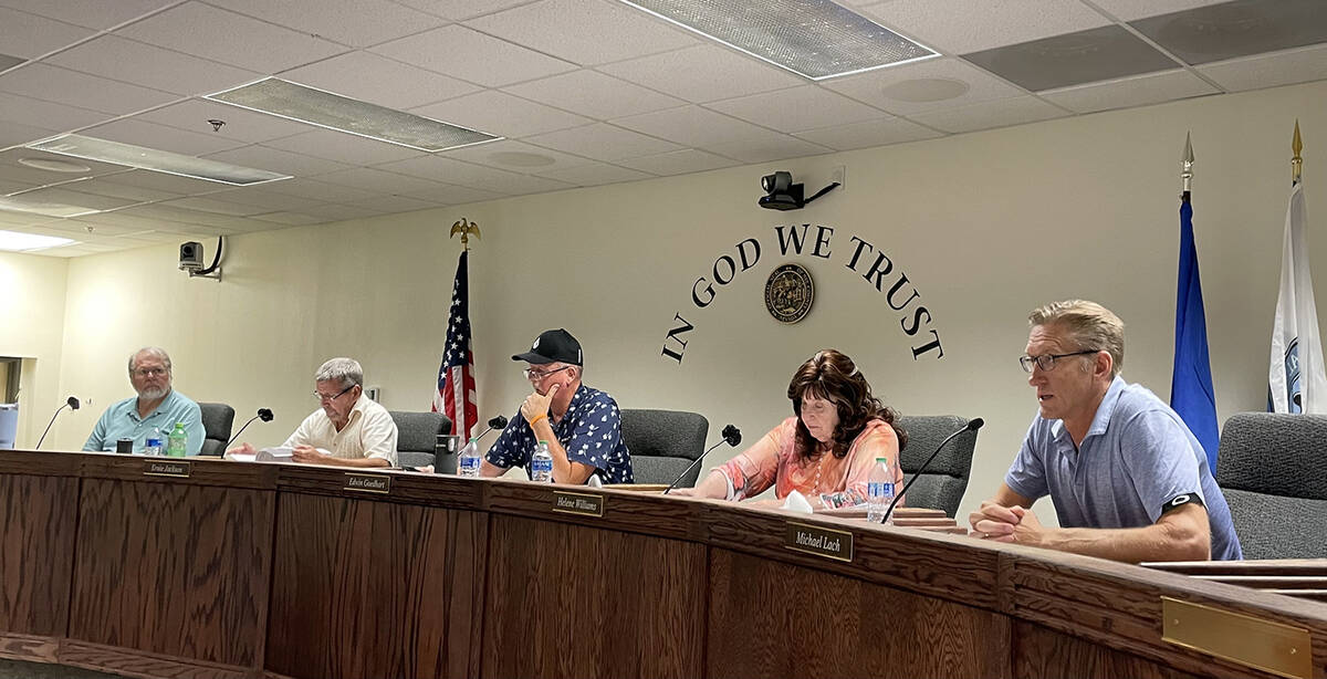 Nye County Water District Nye County water board member Michael Lach, far right, announced that ...