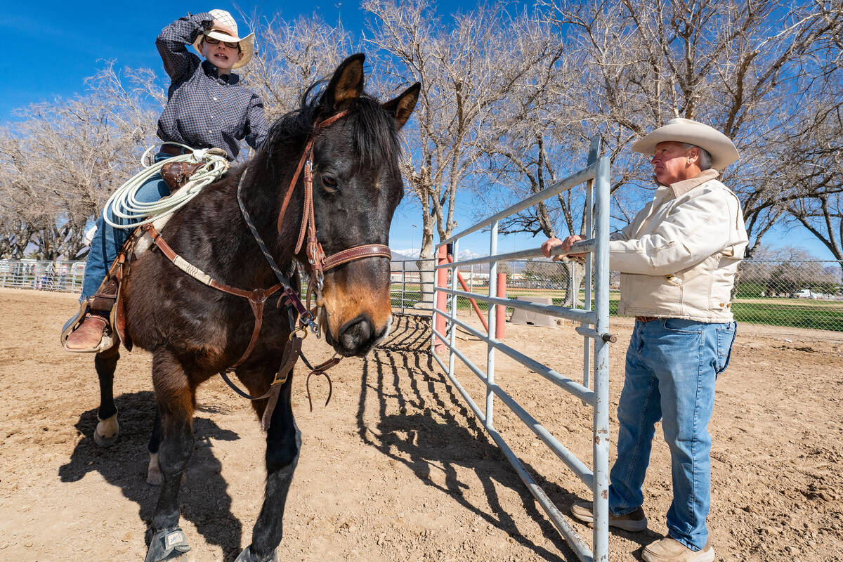 John Clausen/Pahrump Valley Times Former County Clerk Mark Kampf (r), who volunteered for a thi ...