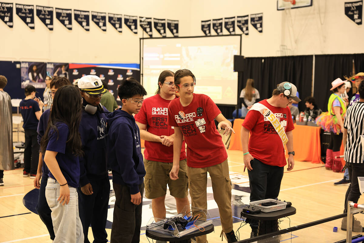 Special to the Pahrump Valley Times Awkward Silence competed at the Robotics State Championship ...