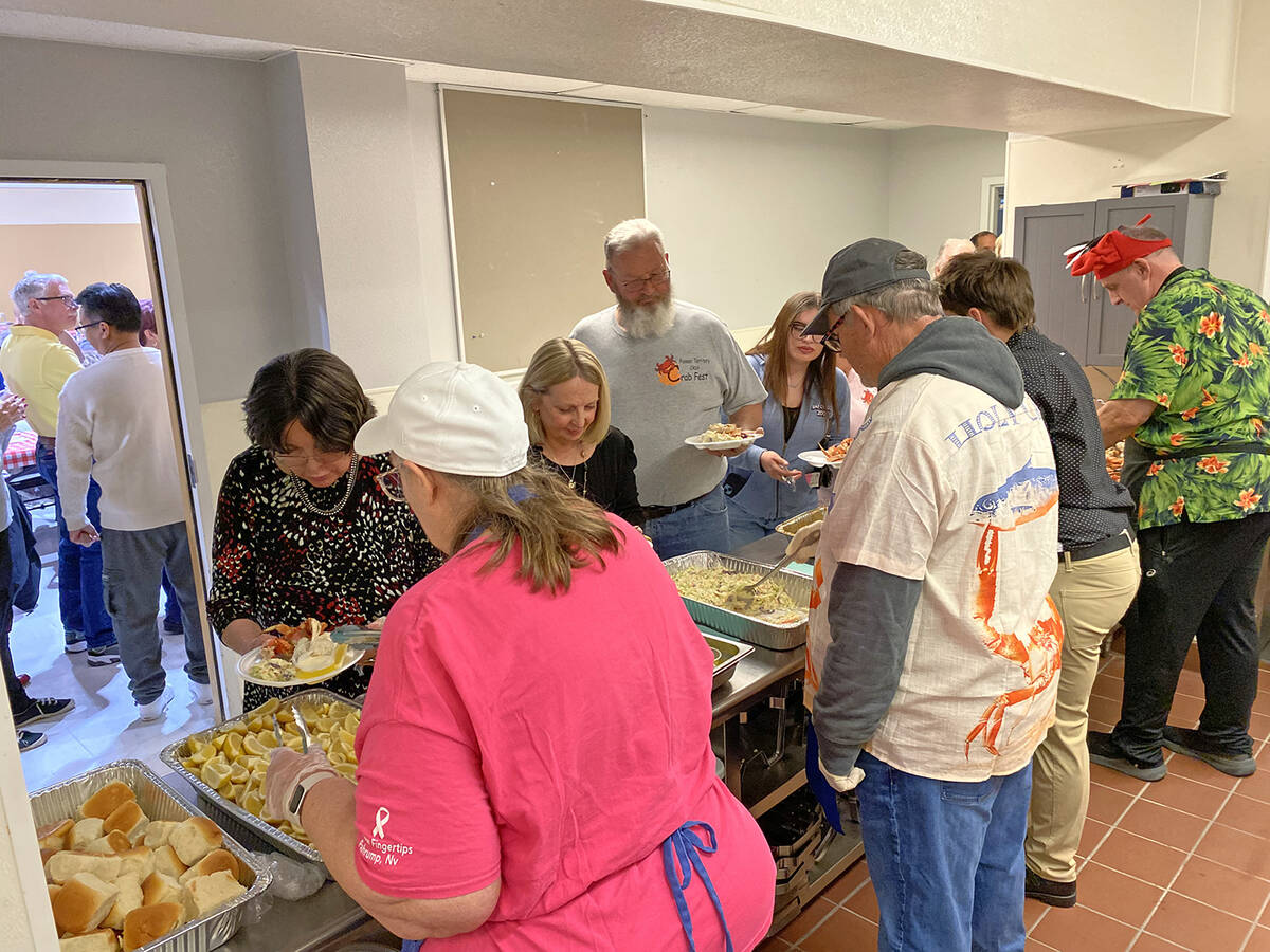 Robin Hebrock/Pahrump Valley Times The buffet line at ACORN's Crab Fest featured hundreds of po ...