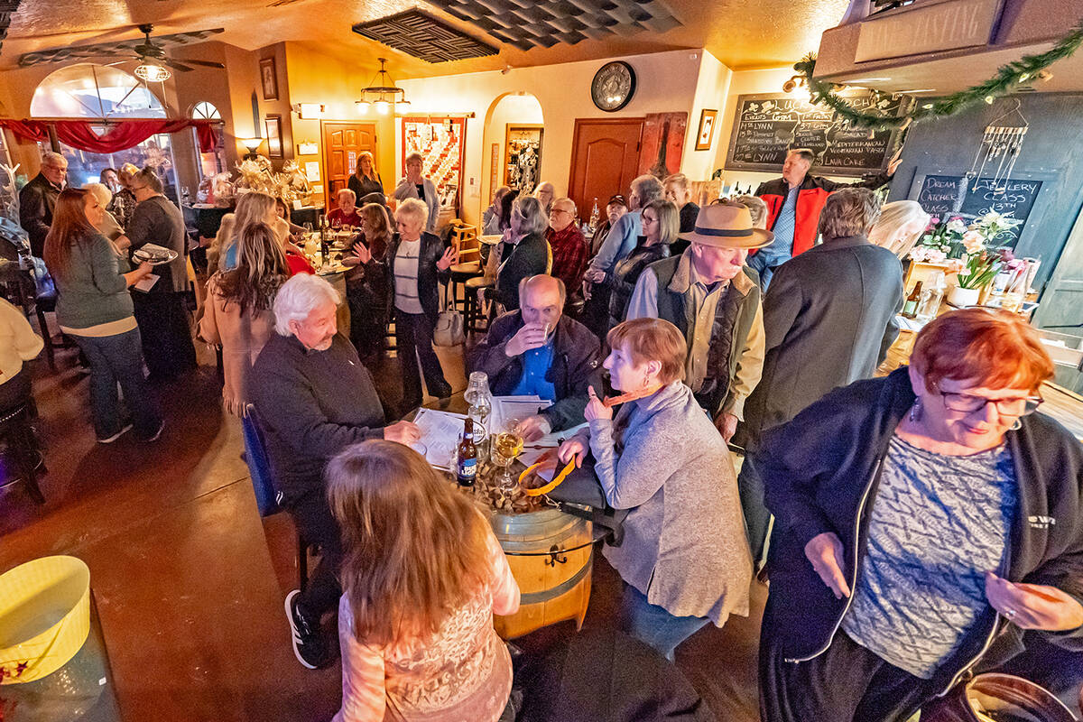 John Clausen/Pahrump Valley Times Artesian Cellars was almost overrun with patrons on March 7 a ...