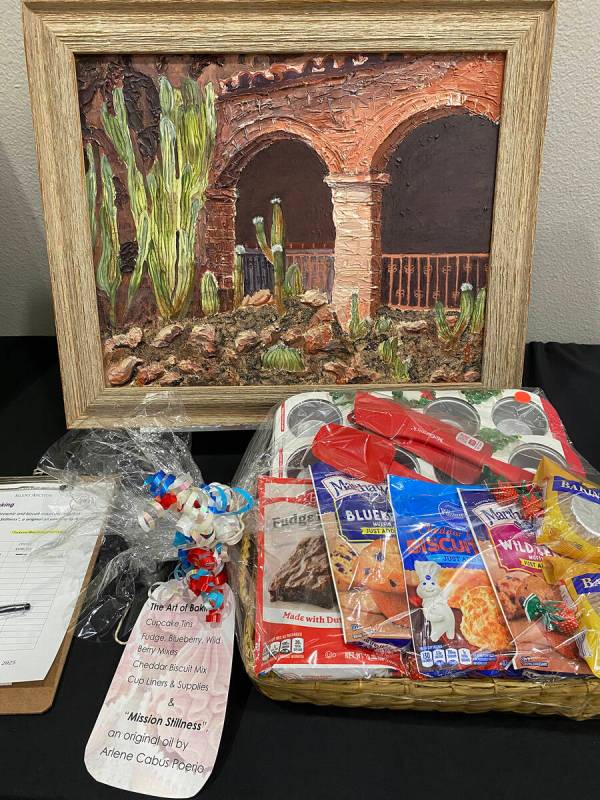 Robin Hebrock/Pahrump Valley Times Silent auction items donated to Art for Recovery ranged from ...