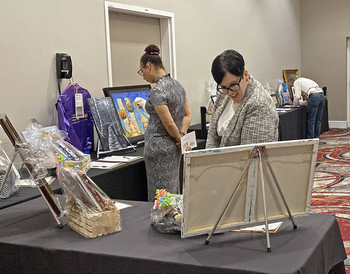 Robin Hebrock/Pahrump Valley Times Art for Recovery attendees were able to browse tables of sil ...