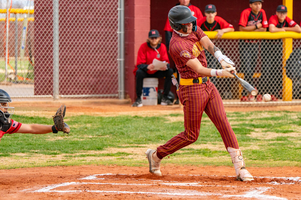 John Clausen/Pahrump Valley Times Senior Aidyn Cratty singles in his at-bat against Mater East ...