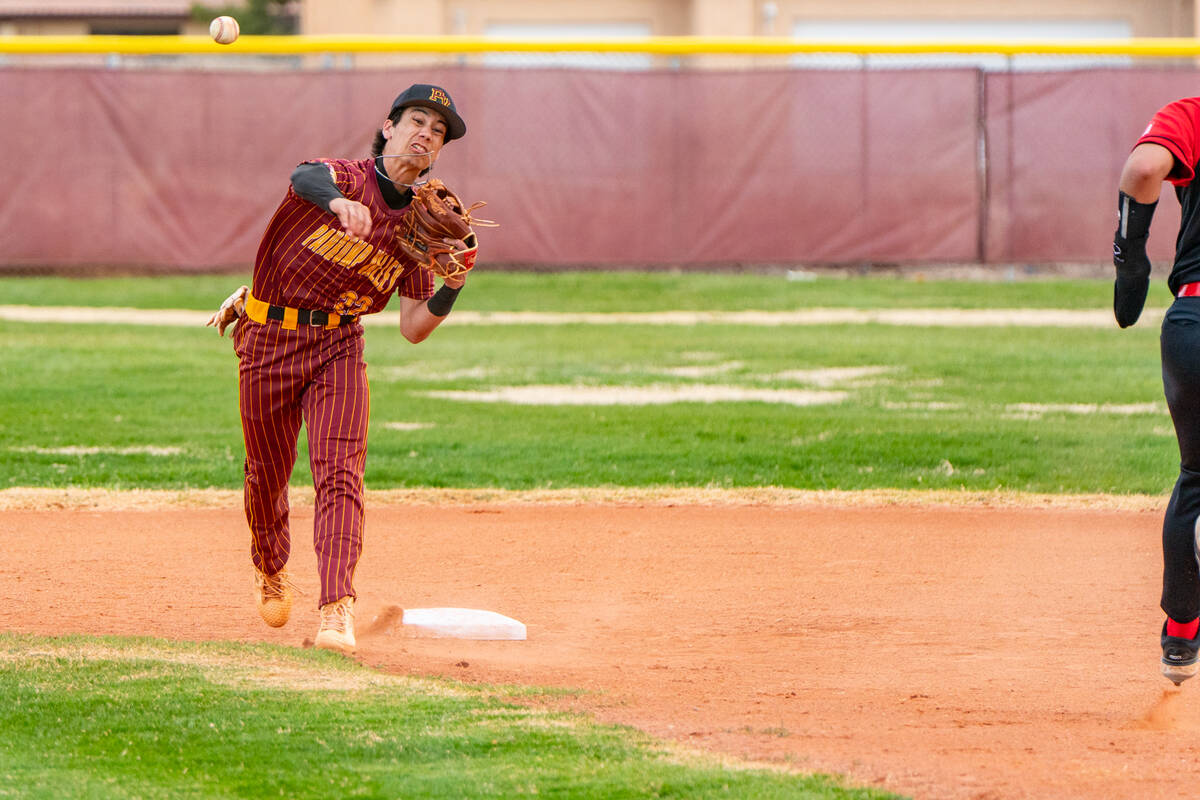 John Clausen/Pahrump Valley Times Sophomore INF Tony Whitney turns a double play against Mater ...