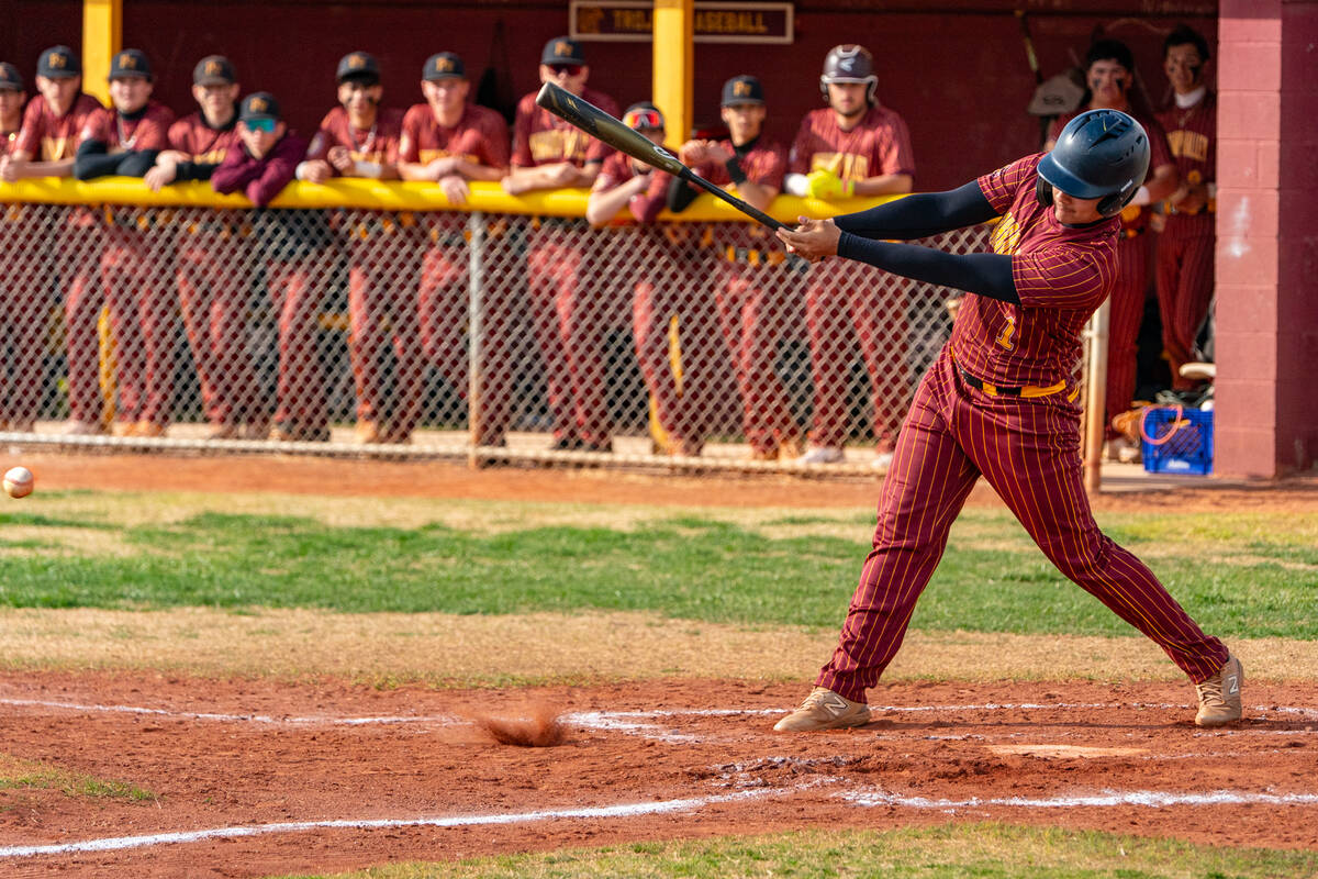 John Clausen/Pahrump Valley Times PVHS freshman Chris Nelson connects on a pitch from Mater Eas ...