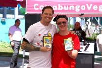 NCSO Nye County Sheriff's Office Captain Harry Means, at left, joins Special Olympics athlete B ...