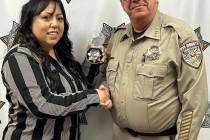 Nye County Sheriff’s Department Former Deputy, now Sgt. Josette Dubois receives her Sgt. bad ...