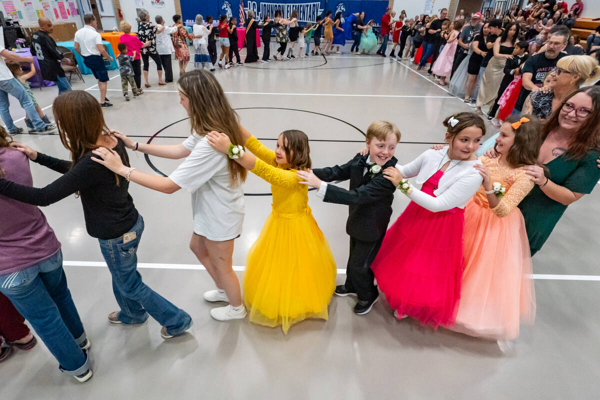 John Clausen/Pahrump Valley Times The Saturday, May 10 event culminated in a conga line winding ...
