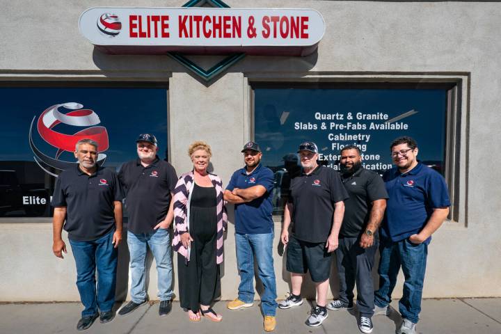 John Clausen/Pahrump Valley Times Elite Kitchen & Stone’s staff stand outside their new showr ...